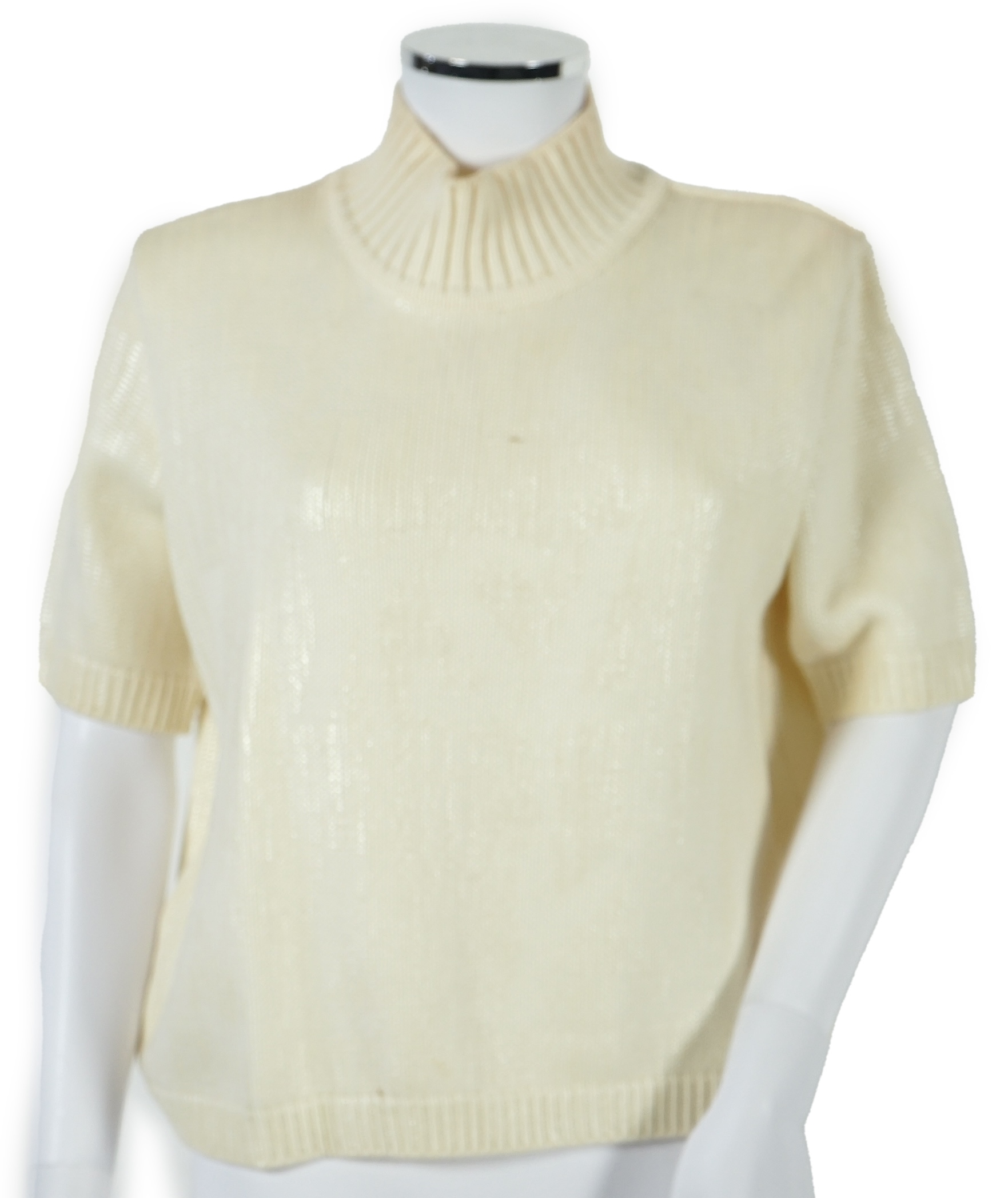 Four vintage Yves Saint Laurent variation lady's tops, F 40 (UK 12).Proceeds to Happy Paws Puppy Rescue